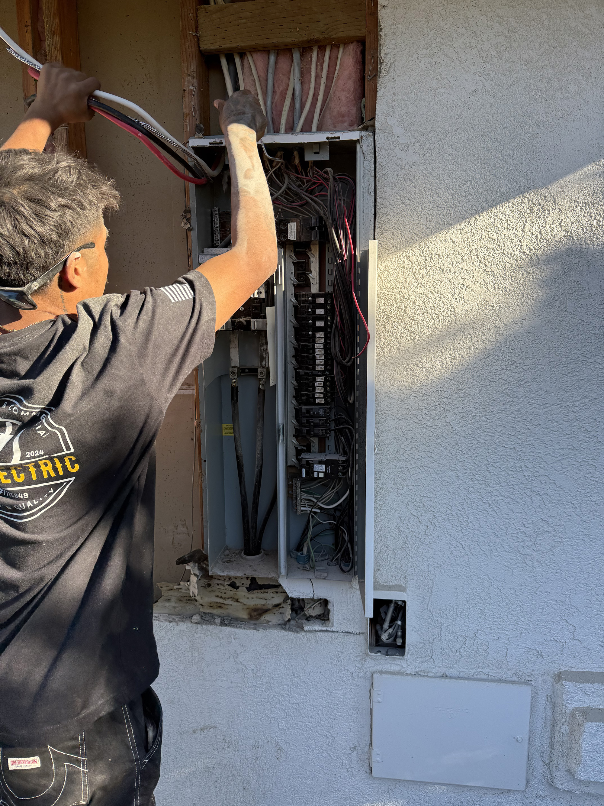 Licensed electrician installing residential electrical panel upgrade in Santa Maria CA 93455