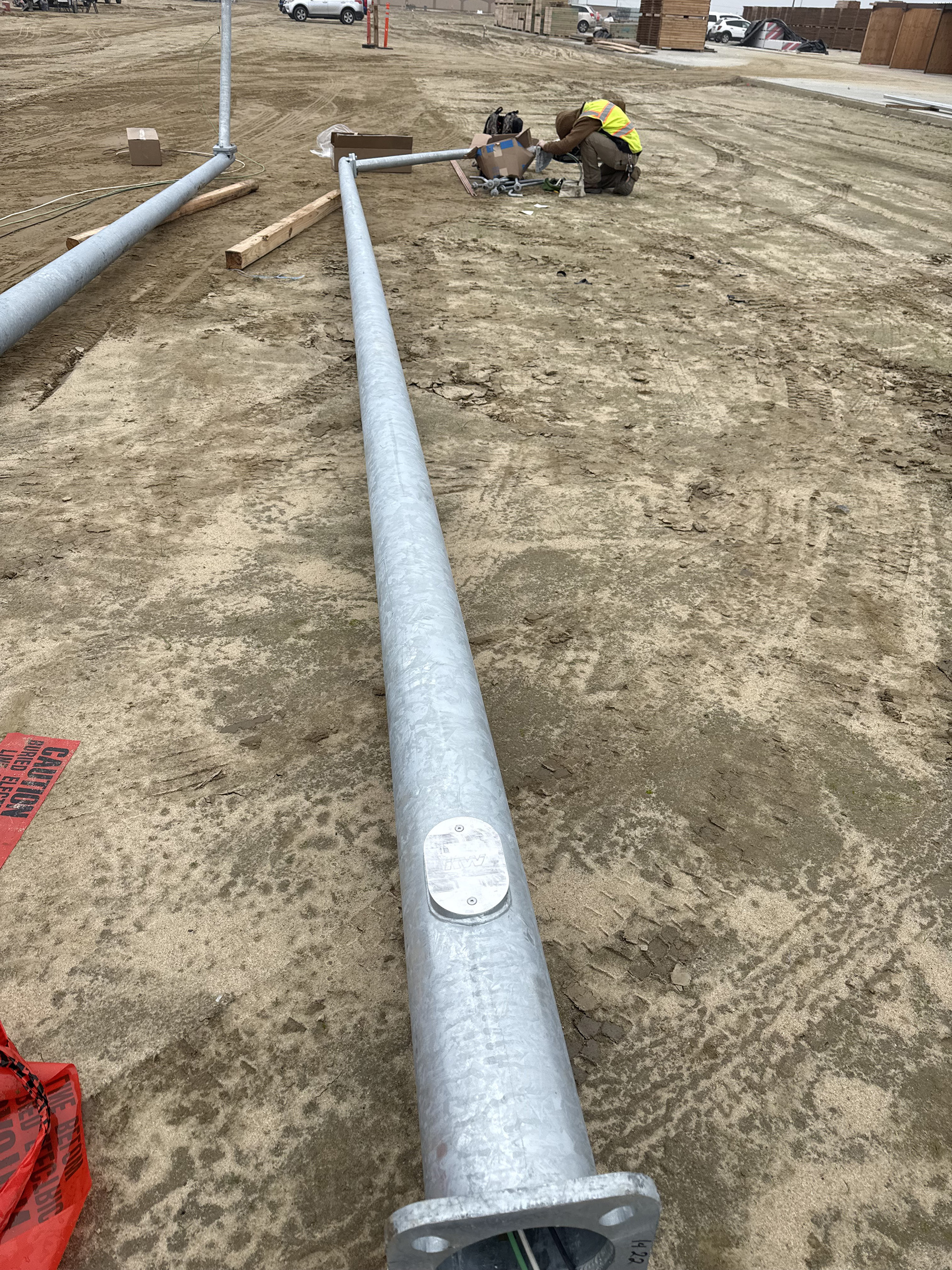 Galvanized light pole installation construction site Santa Barbara County CA